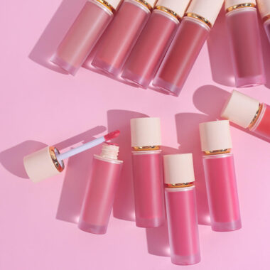 Assorted wholesale lip gloss tubes in various styles and colors