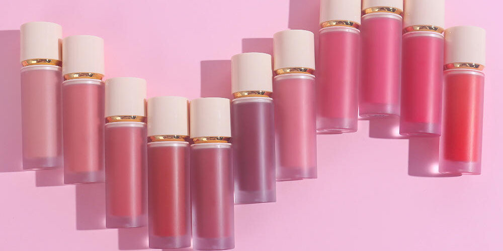 Assorted wholesale lip gloss tubes in various styles and colors