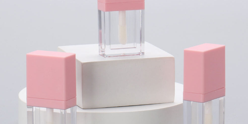 Flat empty pink lipgloss tube for cosmetic packaging