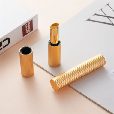 Round gold threaded lipstick tube for luxury beauty packaging