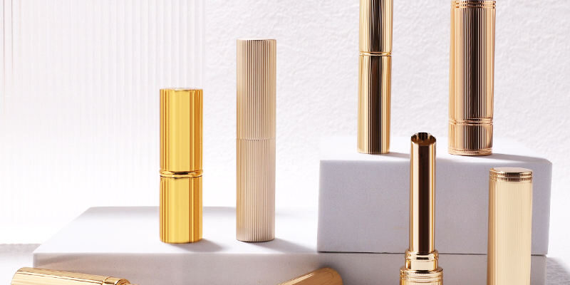 Round gold threaded lipstick tube for luxury beauty packaging