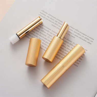 Round gold threaded lipstick tube for luxury beauty packaging