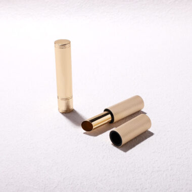 Round gold threaded lipstick tube for luxury beauty packaging