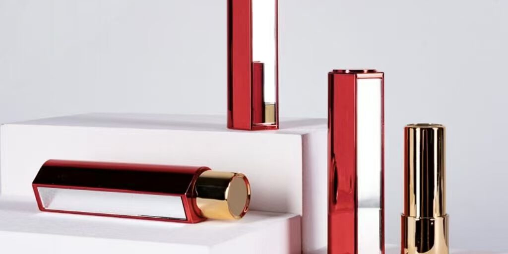 Round lipstick tube with mirror and push button for beauty packaging